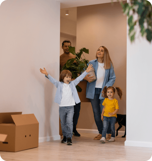 Happy family with their pet enjoying their new home found through CribLiv